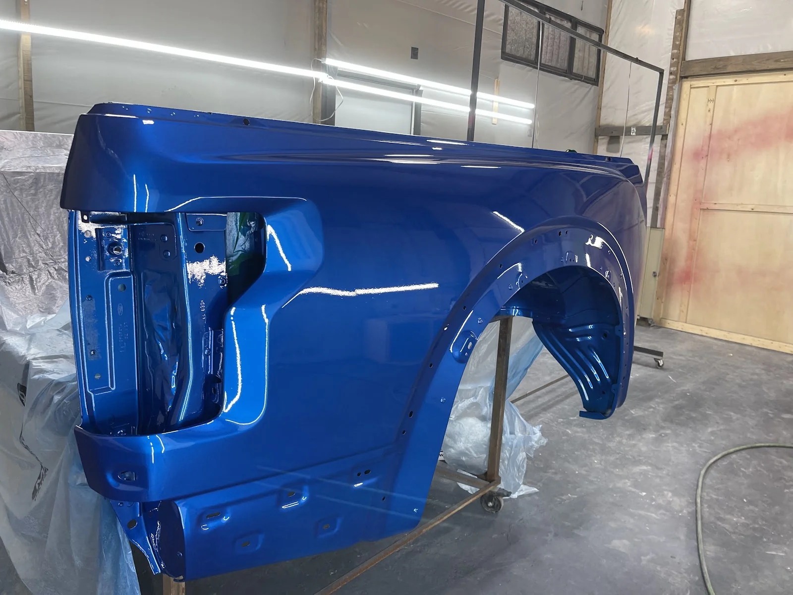 Fresh blue F150 panel — factory-grade refinish at Correct It Collision